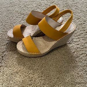 Katherine Kelly yellow wedges